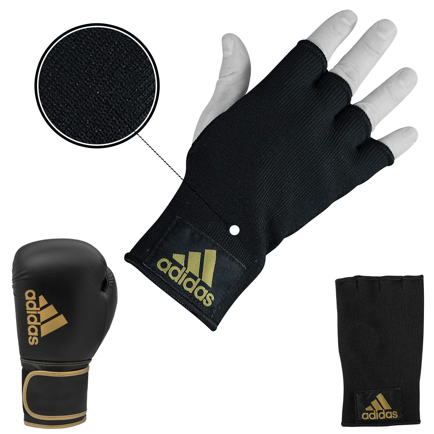 Black and white adidas boxing gloves set.