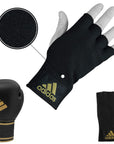 Black and white adidas boxing gloves set.