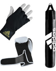 Black punching bag and gloves set for boxing workouts.