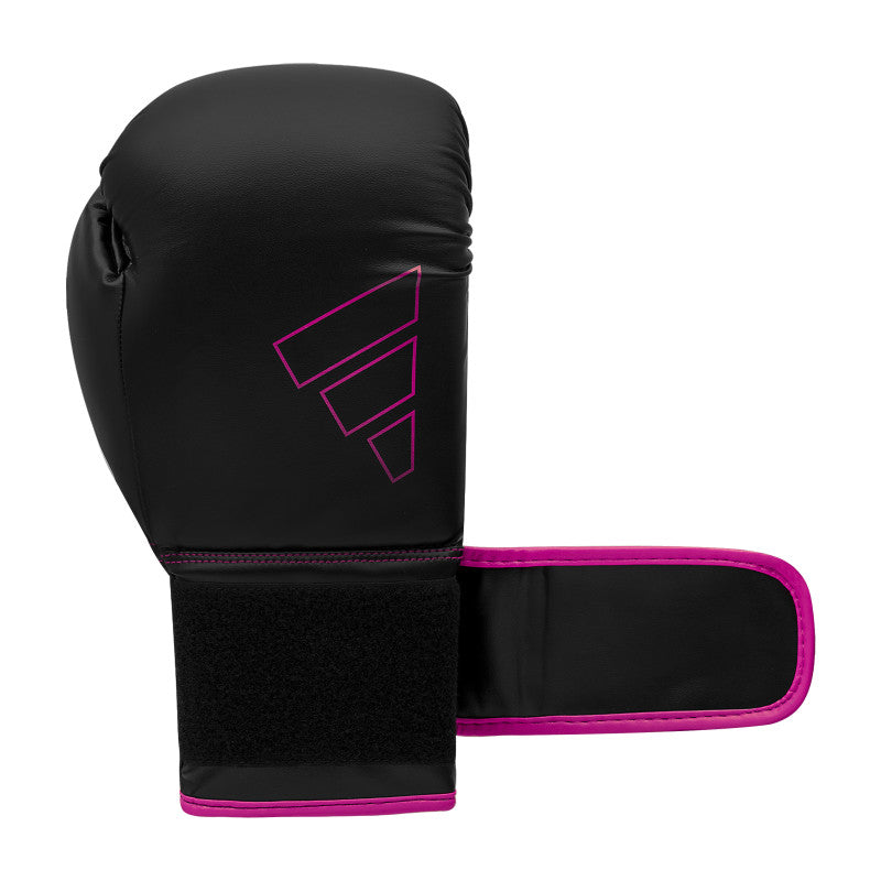 Black and pink Adidas Hybrid 80 boxing glove.