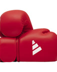 Pair of red Adidas boxing gloves.