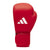 Red boxing glove with a white logo, demonstrating Adidas IBA competition gloves.