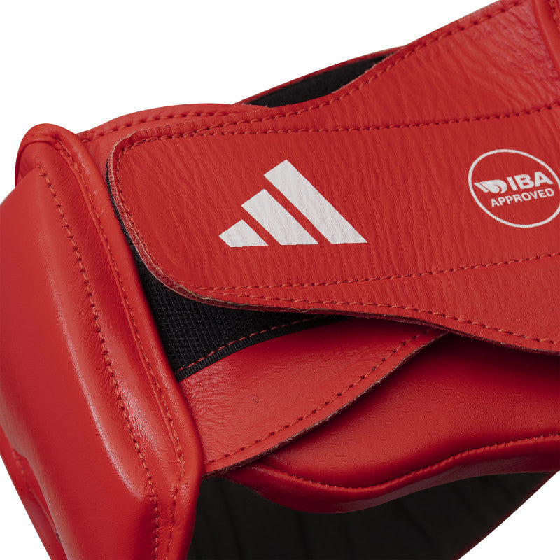 Close up of a red boxing glove.