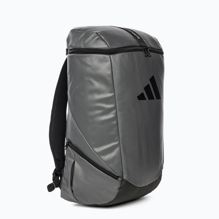 A grey backpack with a black strap, size L, for sports.