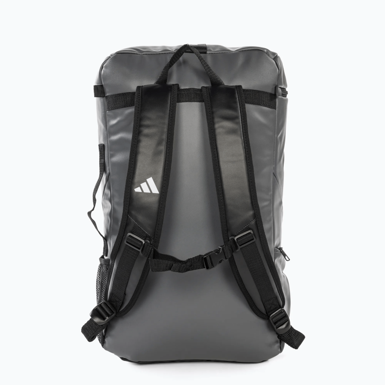 Back view of a grey backpack, highlighting the black straps.