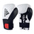 Pair of white and black boxing gloves, 14 oz size.