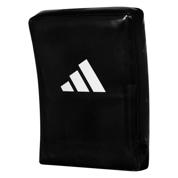 Black adidas pad with a white logo for kick training.