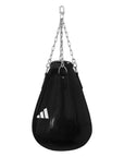 Black punching bag hanging from a chain, Adidas Maize Heavy Bag.