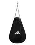 Black Adidas punching bag with chains for boxing.