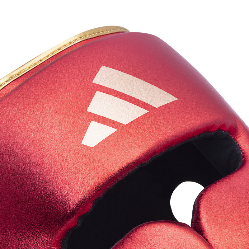 Close up of a boxing glove placed on a flat surface.