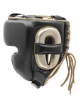 Black and gold boxing mask, part of protective boxing equipment.