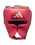 A red boxing helmet featuring a white logo.