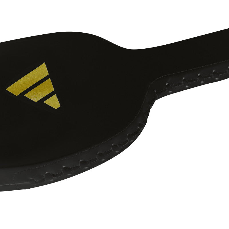 Black paddle with a yellow logo, used in boxing.