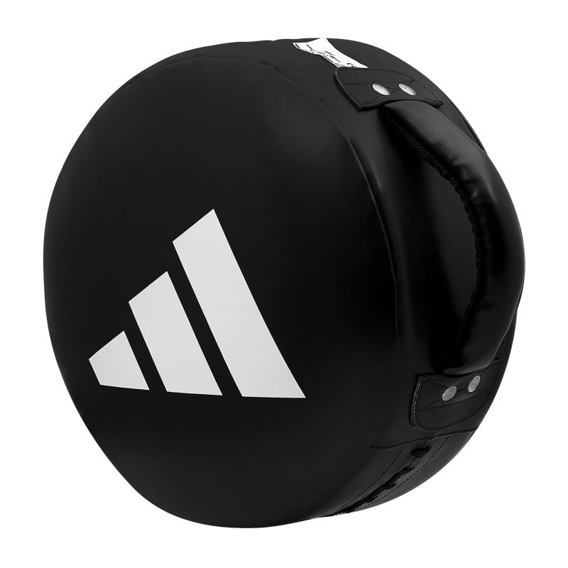 Black and white circular object with white logo.