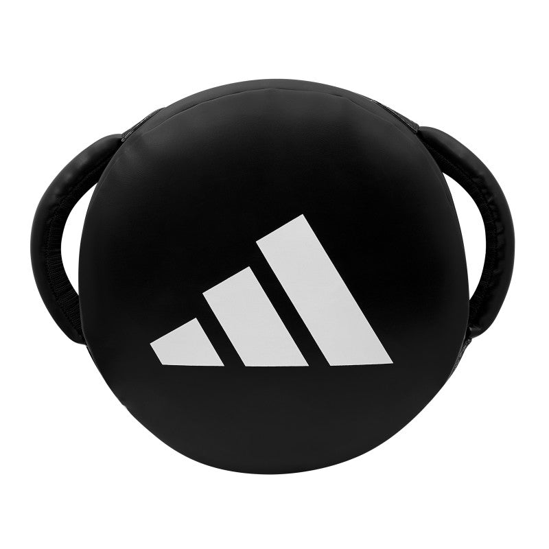 Black round kick shield with white logo.