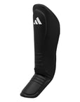 Black shin guard with white logo for Boxing Protective Equipment.