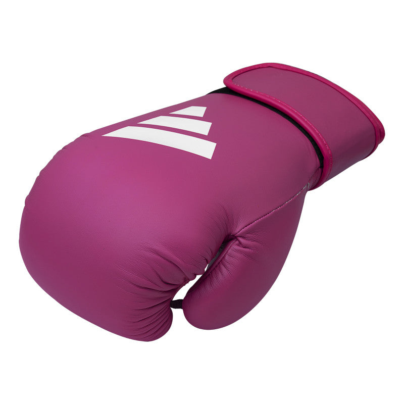 Pink boxing glove with white stripes, adidas FLX 3.0 Speed 50 for boxing and kickboxing.