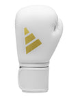 White boxing glove with gold logo, Adidas FLX 3.0 Speed 50.