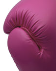 Close up of pink boxing glove for training.