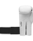 White boxing glove with black straps displayed against a neutral background.