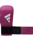 A pink boxing glove with a black strap, adidas FLX 3.0 Speed 50.