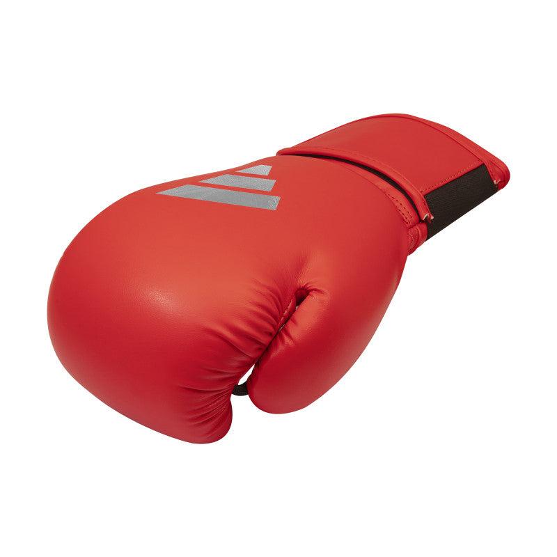 Red boxing glove with a visible logo.