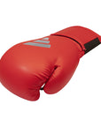 Red boxing glove with a visible logo.