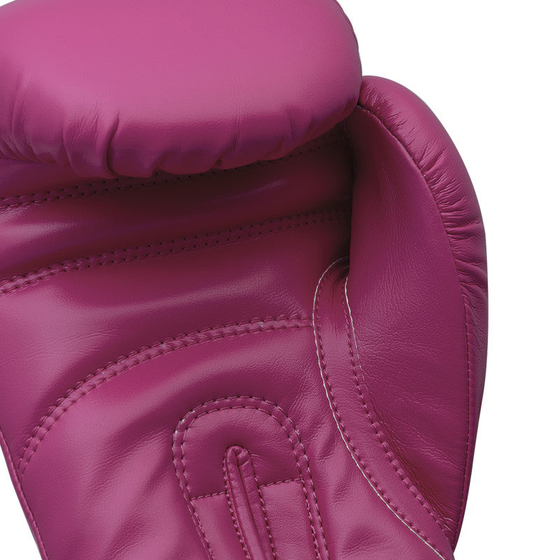 Close up of pink boxing glove for training.