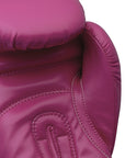 Close up of pink boxing glove for training.