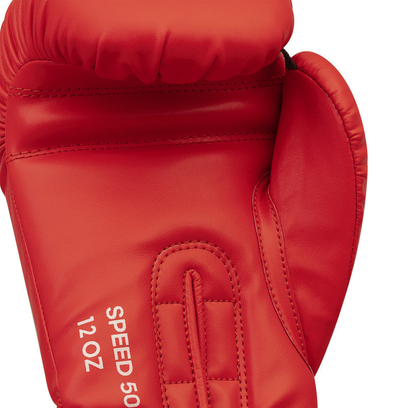 Red boxing glove with white logo text, ideal for athletes.