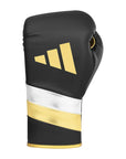 Black and gold adidas Adi-Speed 500 boxing glove.