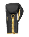 Black and gold boxing glove for pro boxing and kickboxing.