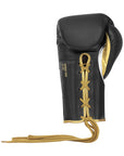 Black and gold boxing glove for pro boxing and kickboxing.