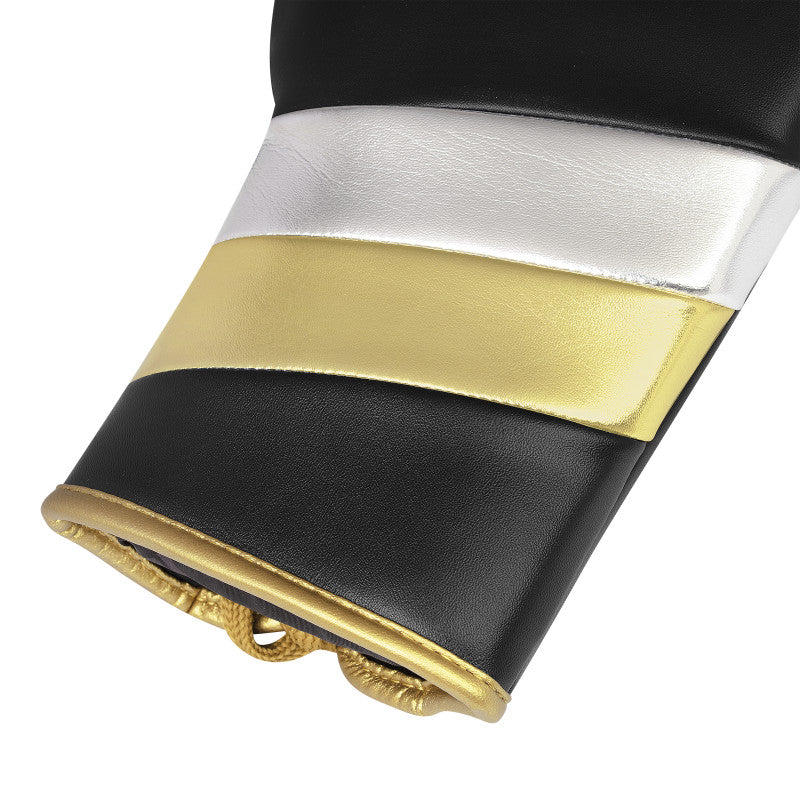 Close-up of black and gold adidas boxing glove.