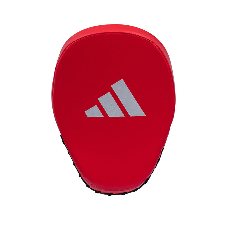 A red curved focus mitt with a logo.