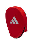 Red pad with white logo for boxing training.