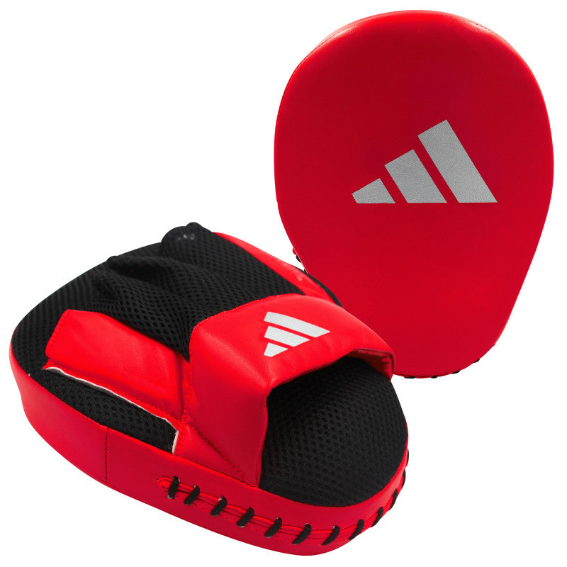 Red and black boxing glove for training.