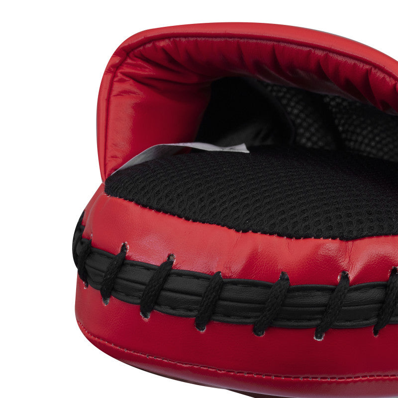 Red boxing glove with black laces, featured in Speed Coach FM equipment.