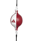 Red and white punching bag suitable for boxing workouts.