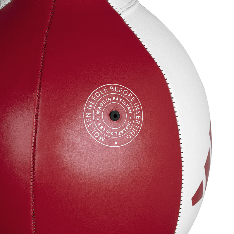 Close up of a red and white Adidas Speed Double End Ball.