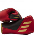 adidas Speed Tilt 750 fight gloves pair used in boxing.