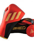 Pair of adidas Speed Tilt 750 fight gloves for boxing.