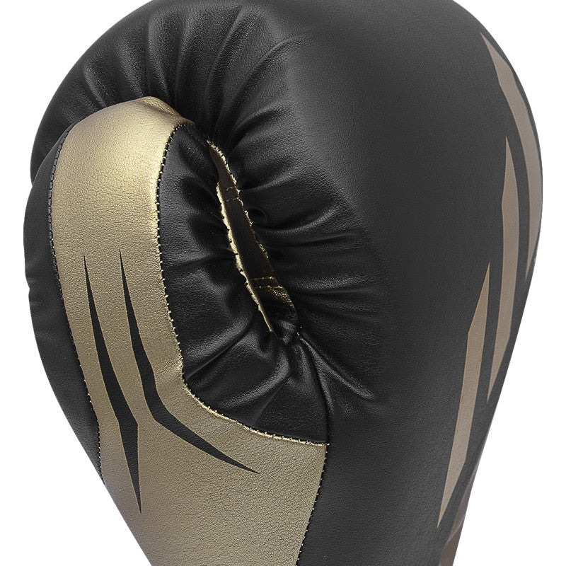 Black and gold Tilt 350 PRO boxing glove.