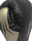 Black and gold Tilt 350 PRO boxing glove.