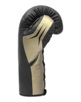 A black and gold boxing glove for training.