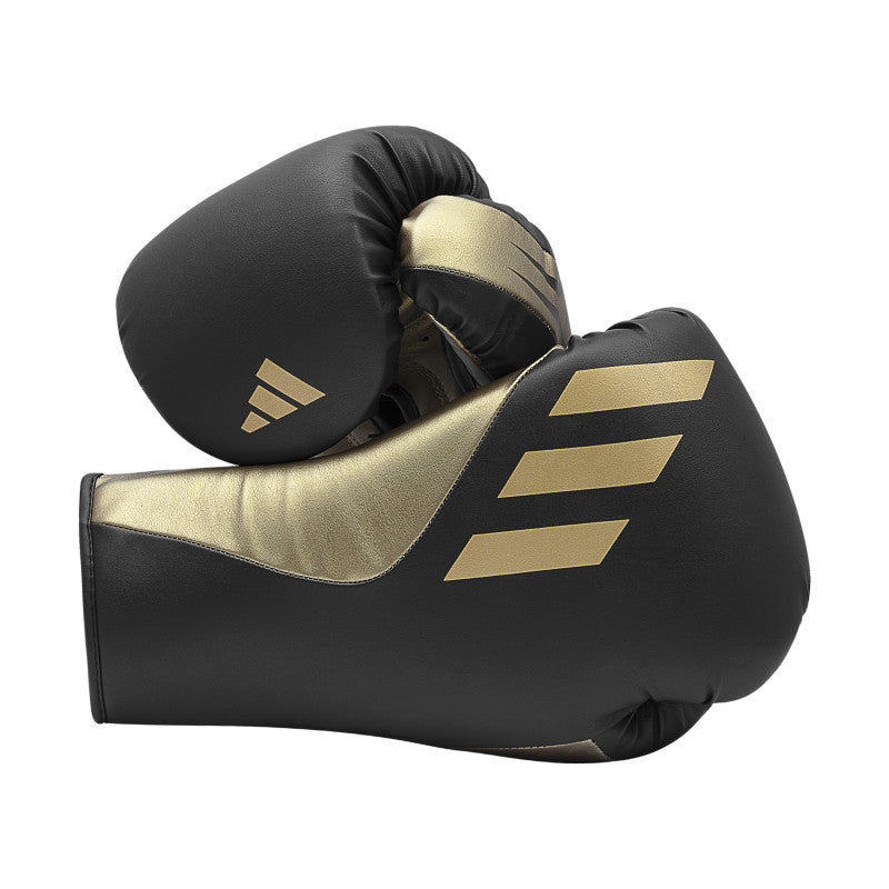 A pair of boxing gloves for training, lace-up design.