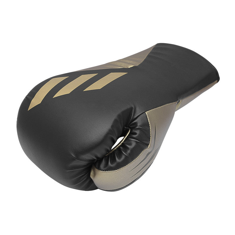 A black and gold boxing glove from the Tilt 350 PRO.