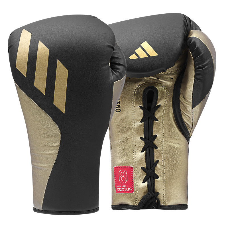 A pair of boxing gloves for training, lace-up design.