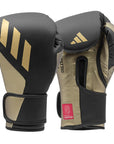 Black and gold Tilt 350 PRO training boxing gloves in 14 oz size.