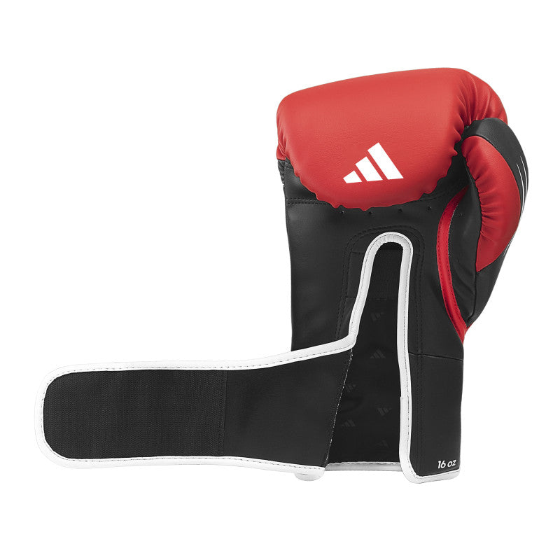 A red and black boxing glove, Tilt 350 PRO Training model.